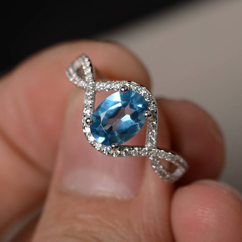 2.25 Ct Oval Cut Blue Topaz 925 Sterling Silver Infinity Engagement/Promise Ring