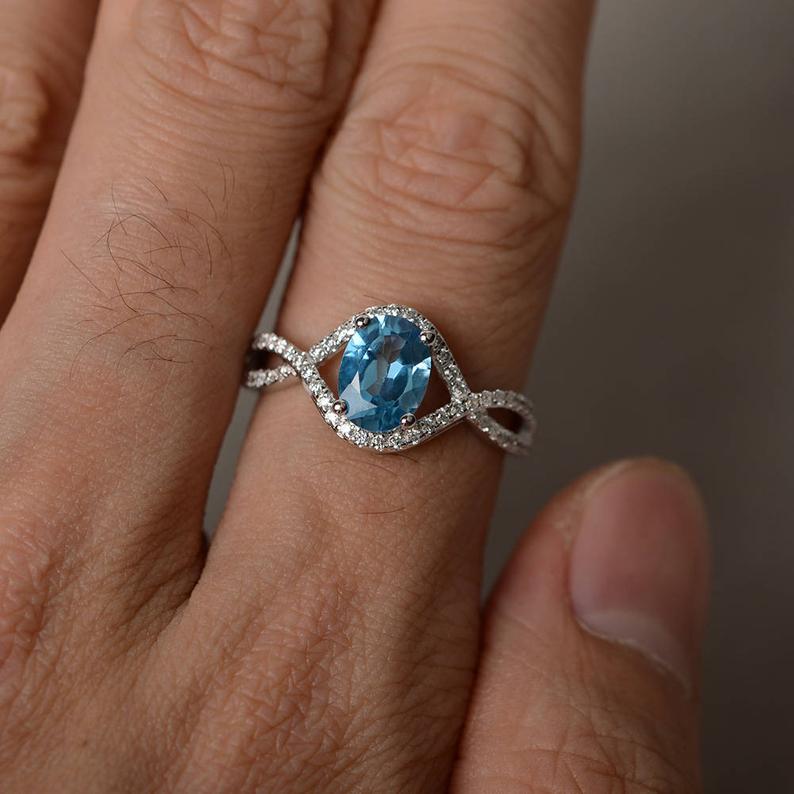 2.25 Ct Oval Cut Blue Topaz 925 Sterling Silver Infinity Engagement/Promise Ring