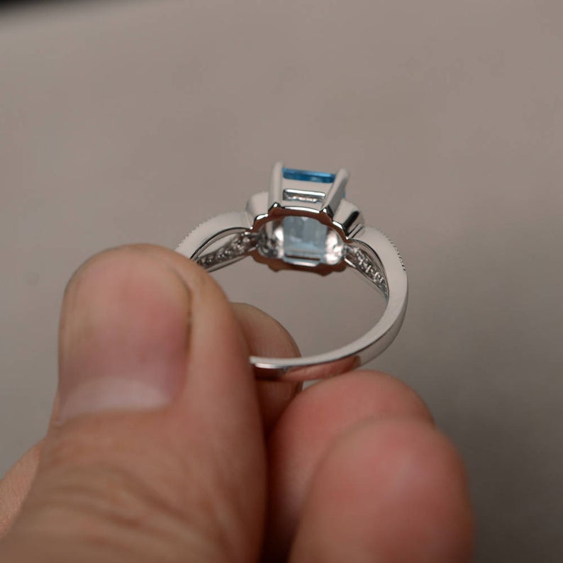 2.25 Ct Emerald Cut Blue Topaz Solitaire W/Accents Engagement Ring In 925 Sterling Silver