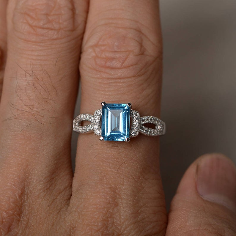 2.25 Ct Emerald Cut Blue Topaz Solitaire W/Accents Engagement Ring In 925 Sterling Silver