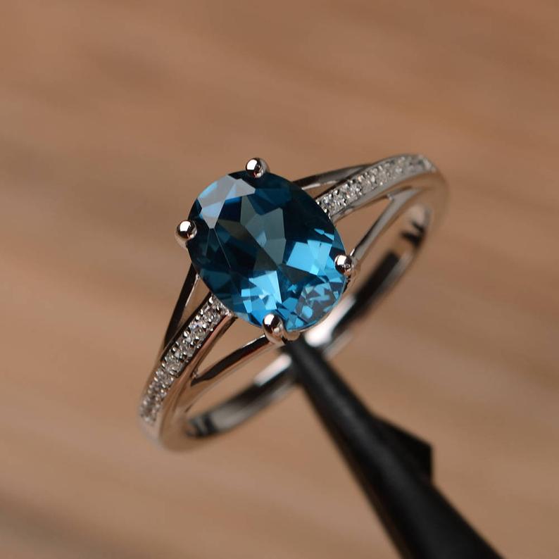1.50 Ct Oval Cut London Blue Topaz Solitaire W/Accents Engagement Ring In 925 Sterling Silver