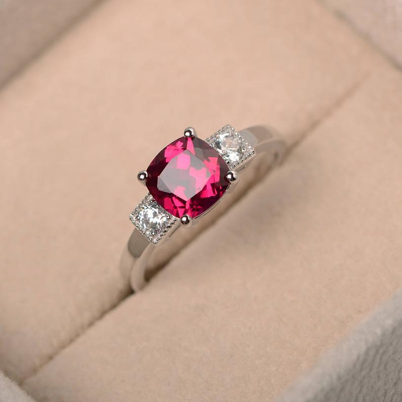 1.50 Ct Cushion Cut Red Ruby & Round CZ Three-Stone Anniversary gift Ring In 925 Sterling Silver