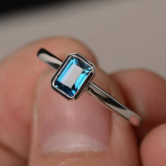 1 Ct Emerald Cut London Blue Topaz Bezel Set Solitaire Ring In 925 Sterling Silver
