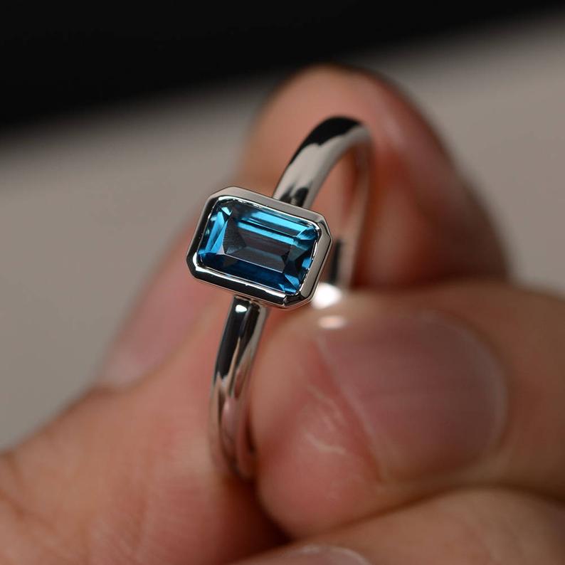 1 Ct Emerald Cut London Blue Topaz Bezel Set Solitaire Ring In 925 Sterling Silver