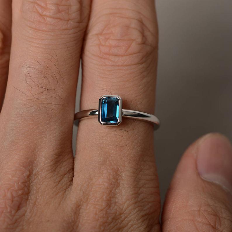 1 Ct Emerald Cut London Blue Topaz Bezel Set Solitaire Ring In 925 Sterling Silver