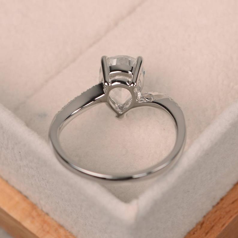 1.75 Ct Pear Cut White Topaz White Gold Over On 925 Sterling Silver Bypass Engagement Ring