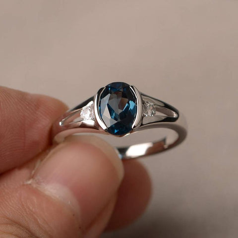 1.20 Ct Oval Cut London Blue Topaz & Round CZ Three-Stone Promise Ring In 925 Sterling Silver