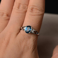 1.20 Ct Oval Cut London Blue Topaz & Round CZ Three-Stone Promise Ring In 925 Sterling Silver