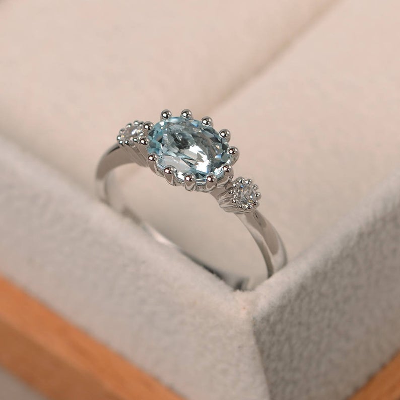 1.50 Ct Oval Cut Aquamarine & Round Cz Three-Stone Promise Ring In 925 Sterling Silver