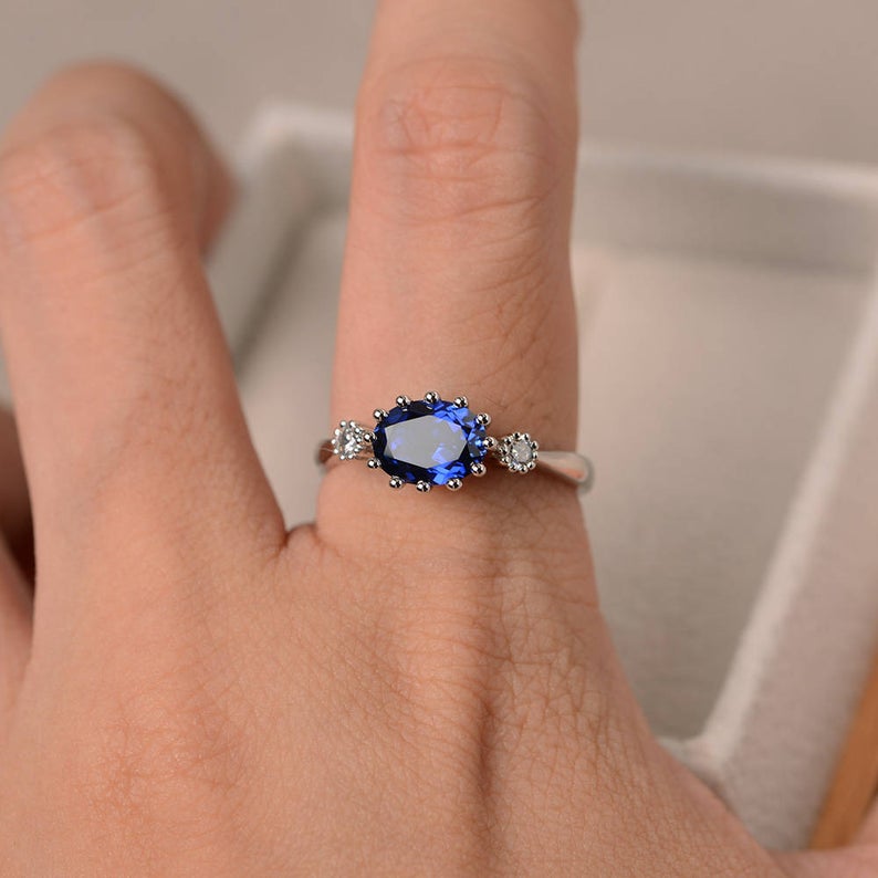 2 Ct Oval Cut Blue Sapphire & Round Cz Three-Stone Promise Ring In 925 Sterling Silver