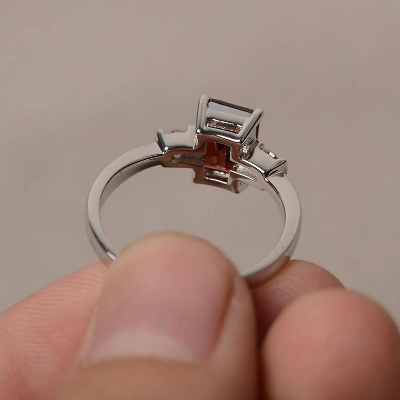 1.50 Ct Emerald Cut Red Garnet & Round CZ 925 Sterling Silver Three-Stone Promise Ring