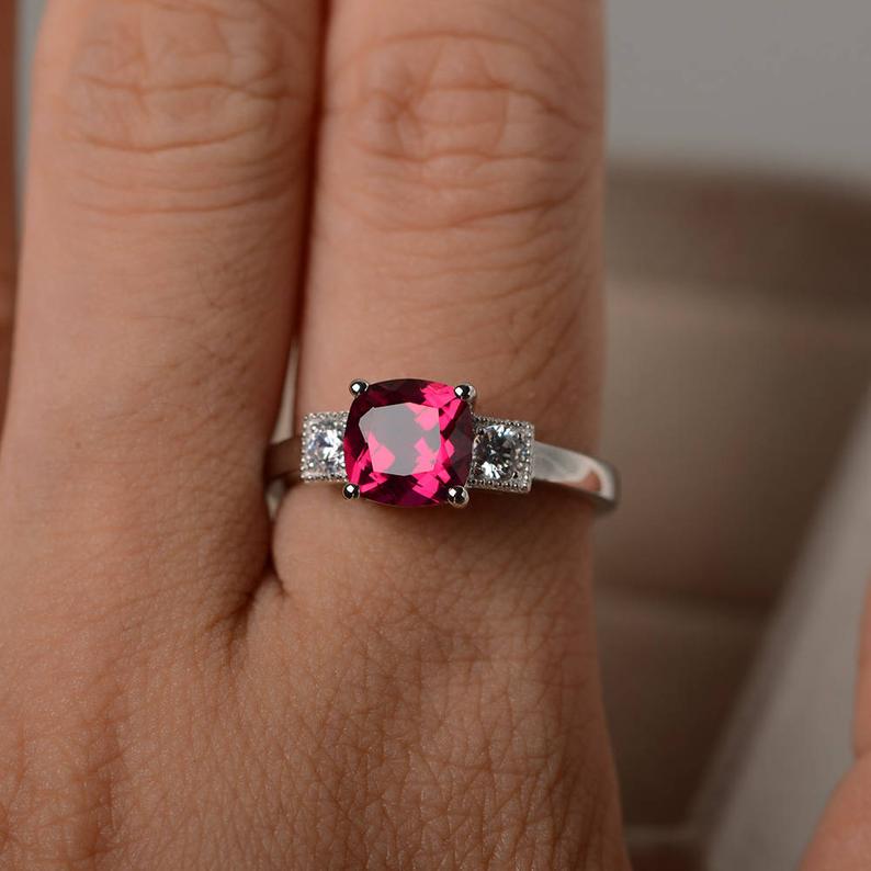 1.50 Ct Cushion Cut Red Ruby & Round CZ Three-Stone Anniversary gift Ring In 925 Sterling Silver