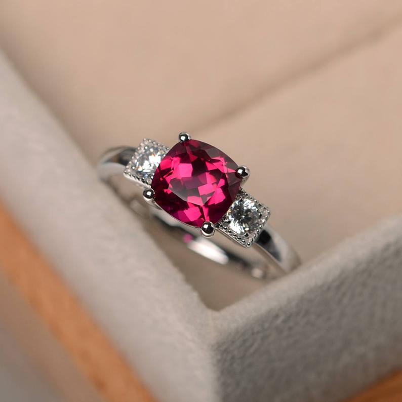 1.50 Ct Cushion Cut Red Ruby & Round CZ Three-Stone Anniversary gift Ring In 925 Sterling Silver