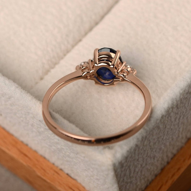 1.50 Ct Oval Cut Blue Sapphire & Round CZ Three-Stone Promise Ring In 925 Sterling Silver - atjewels.in