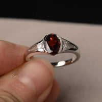 1.25 Ct Oval Cut Red Garnet & Round CZ 925 Sterling Silver Three-Stone Promise Ring