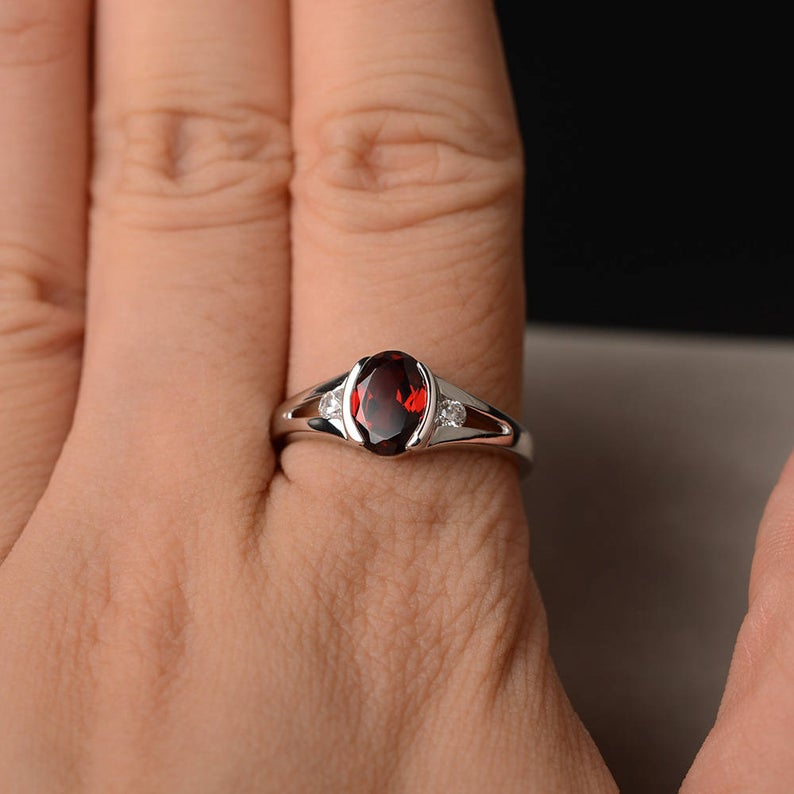 1.25 Ct Oval Cut Red Garnet & Round CZ 925 Sterling Silver Three-Stone Promise Ring