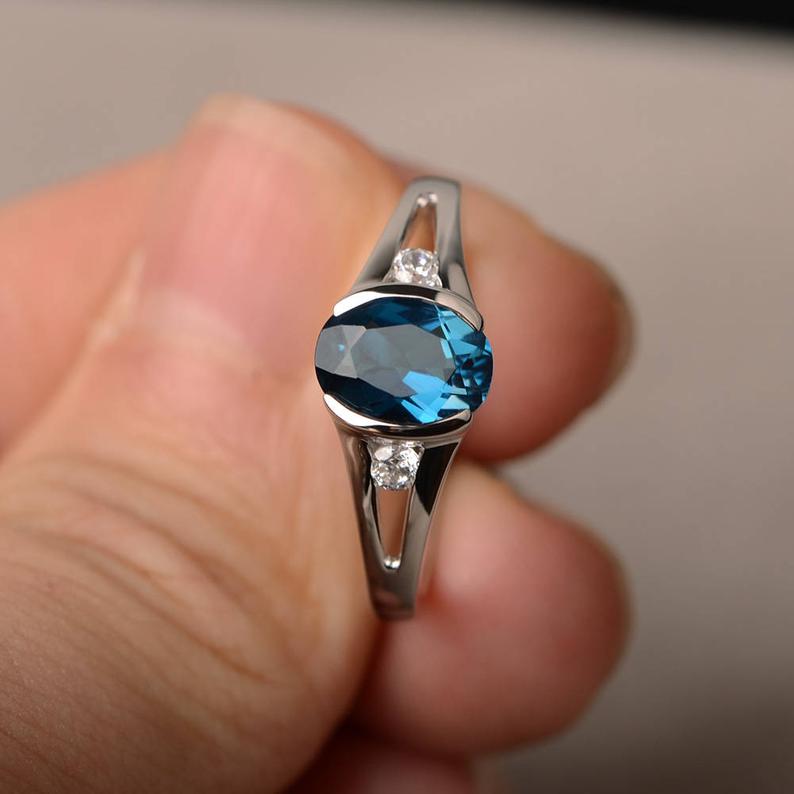 1.20 Ct Oval Cut London Blue Topaz & Round CZ Three-Stone Promise Ring In 925 Sterling Silver