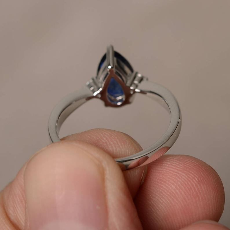 1.20 Ct Pear Cut Blue Sapphire Diamond 925 Sterling Silver Three-Stone Promise Ring