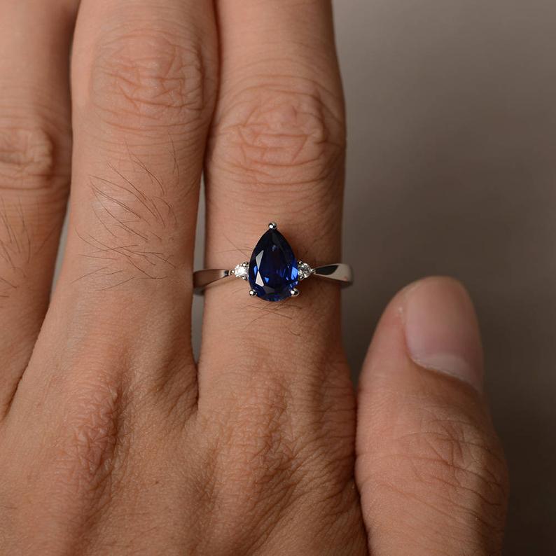 1.20 Ct Pear Cut Blue Sapphire Diamond 925 Sterling Silver Three-Stone Promise Ring