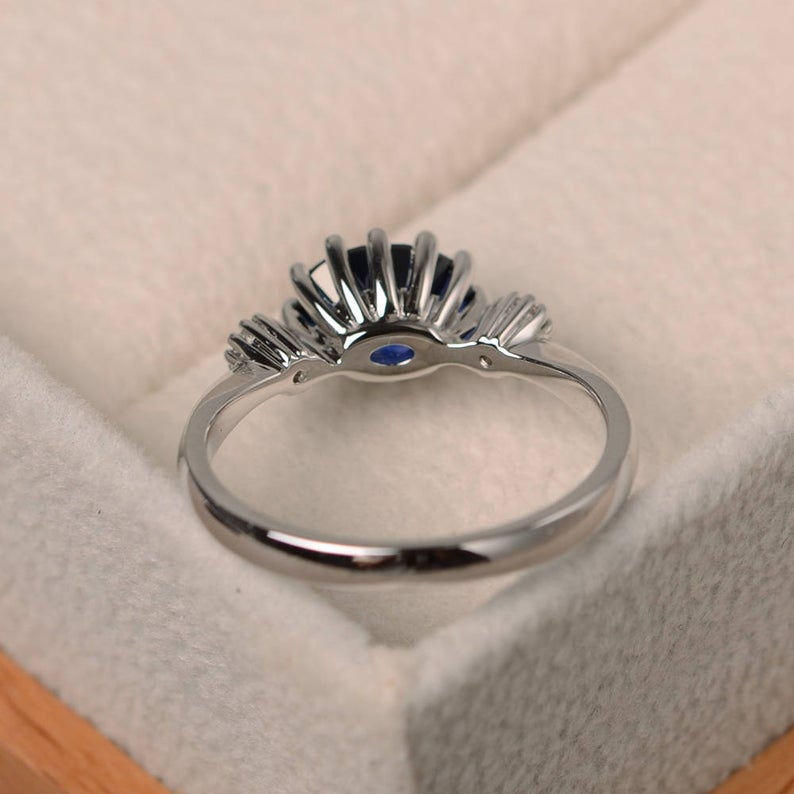 2 Ct Oval Cut Blue Sapphire & Round Cz Three-Stone Promise Ring In 925 Sterling Silver