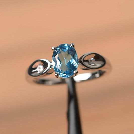 1.20 Ct Oval Cut Blue Topaz & Round CZ 925 Sterling Silver Three-Stone Promise Ring