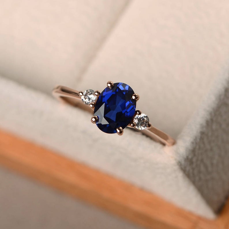 1.20 Ct Oval Cut Blue Sapphire Rose Gold Over On 925 Sterling Silver Three-Stone Promise Ring