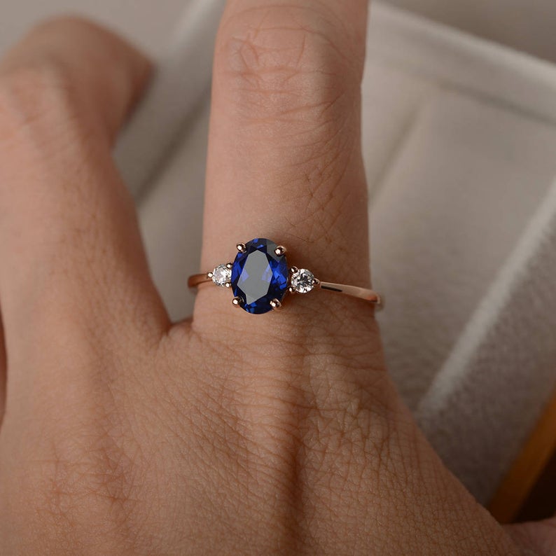 1.50 Ct Oval Cut Blue Sapphire & Round CZ Three-Stone Promise Ring In 925 Sterling Silver