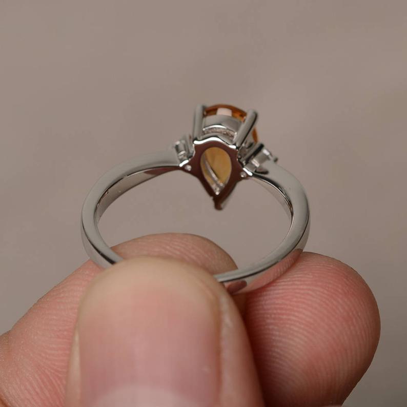 1.20 Ct Pear Cut Yellow Citrine & Round CZ 925 Sterling Silver Three-Stone Promise Ring