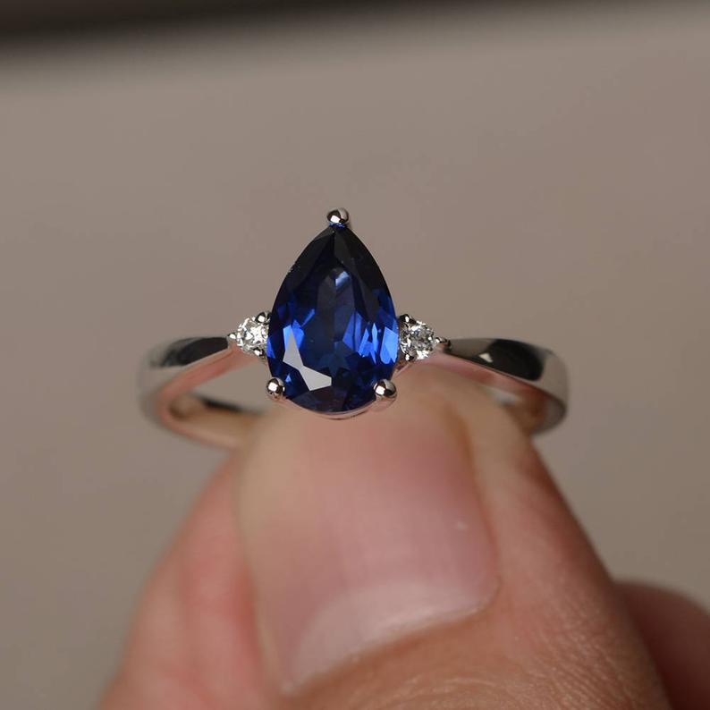 1.20 Ct Pear Cut Blue Sapphire Diamond 925 Sterling Silver Three-Stone Promise Ring