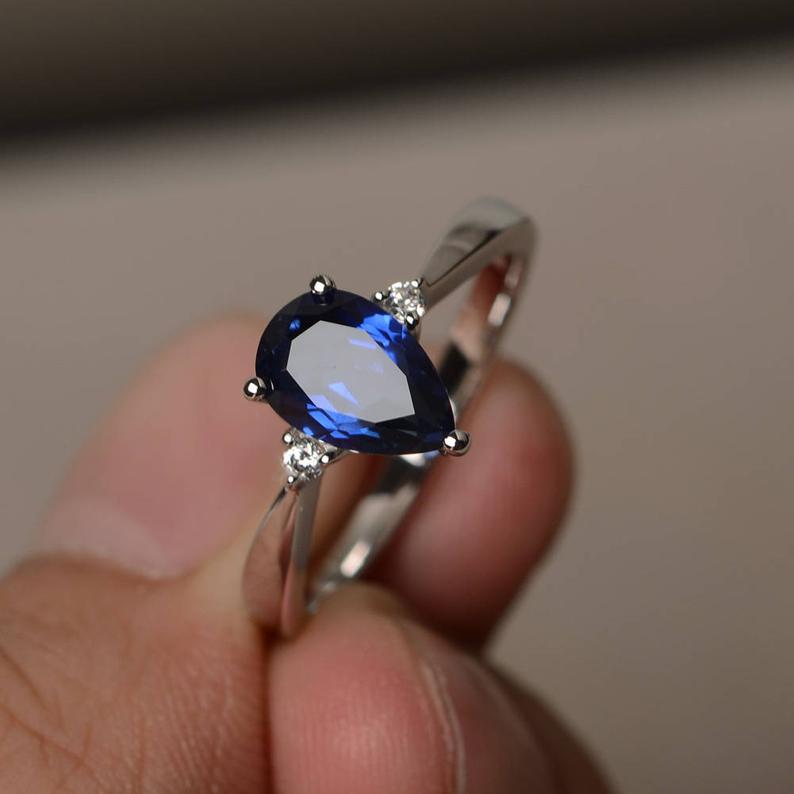 1.20 Ct Pear Cut Blue Sapphire Diamond 925 Sterling Silver Three-Stone Promise Ring