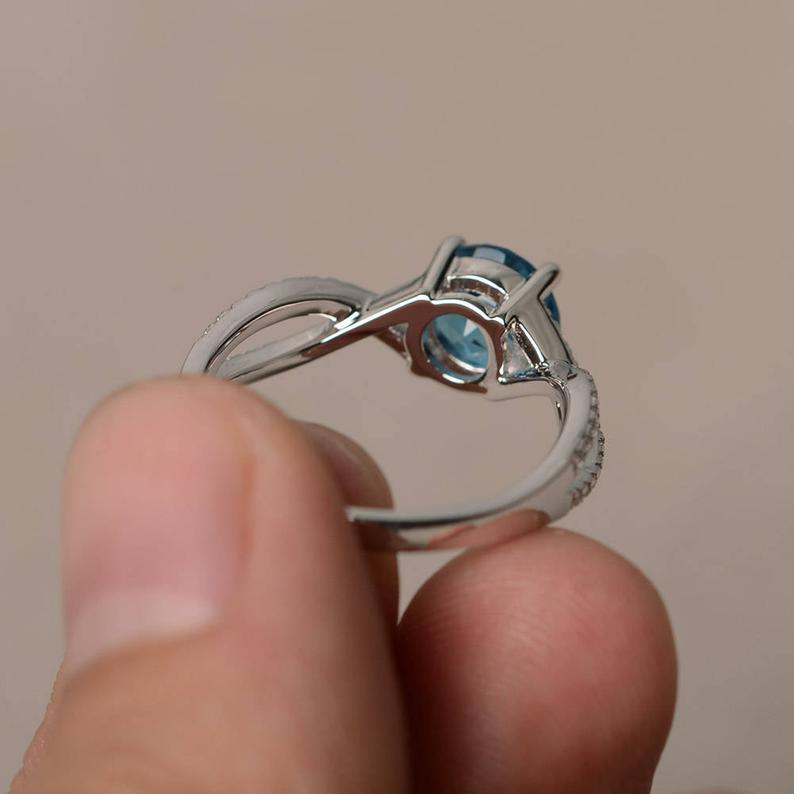 1.50 Ct Round Cut Blue Topaz & White CZ 925 Sterling Silver Infinity Promise Ring