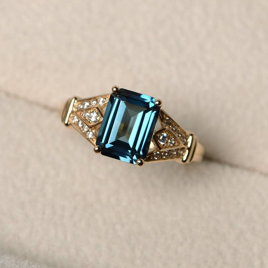 2.75 Ct Emerald Cut London Blue Topaz Yellow Gold Over On 925 Sterling Silver Unique Engagement Ring