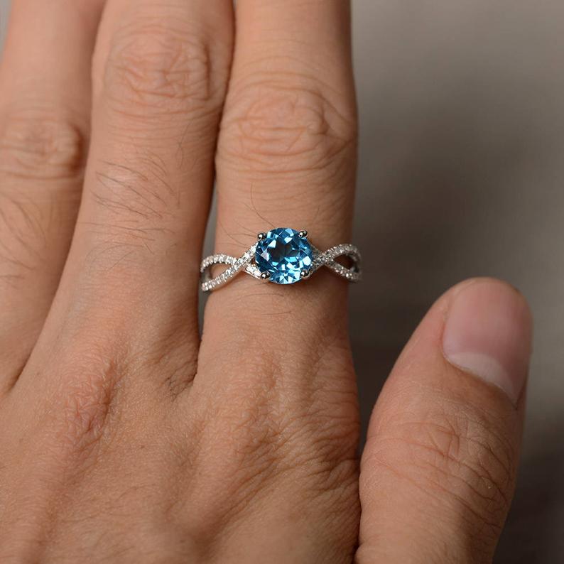 1.50 Ct Round Cut Blue Topaz & White CZ 925 Sterling Silver Infinity Promise Ring