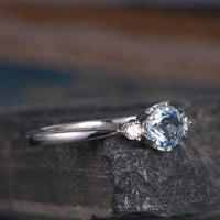 1.20 Ct Round Cut Aquamarine & Round CZ 925 Sterling Silver Three-Stone Engagement Ring