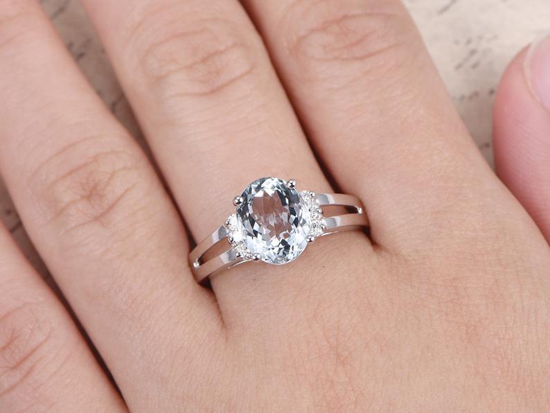 1.25 Ct Oval Cut Aquamarine Solitaire W/Accents Split Shank Ring In 925 Sterling Silver