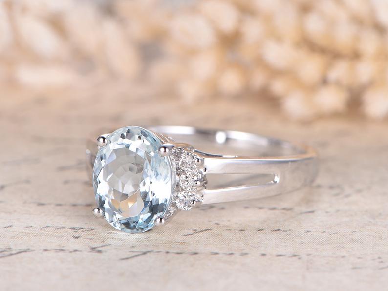 1.25 Ct Oval Cut Aquamarine Solitaire W/Accents Split Shank Ring In 925 Sterling Silver