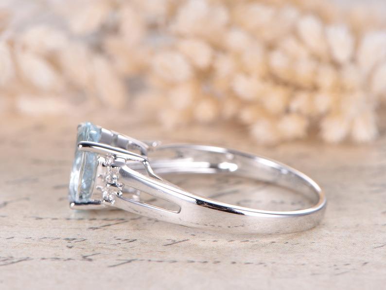 1.25 Ct Oval Cut Aquamarine Solitaire W/Accents Split Shank Ring In 925 Sterling Silver