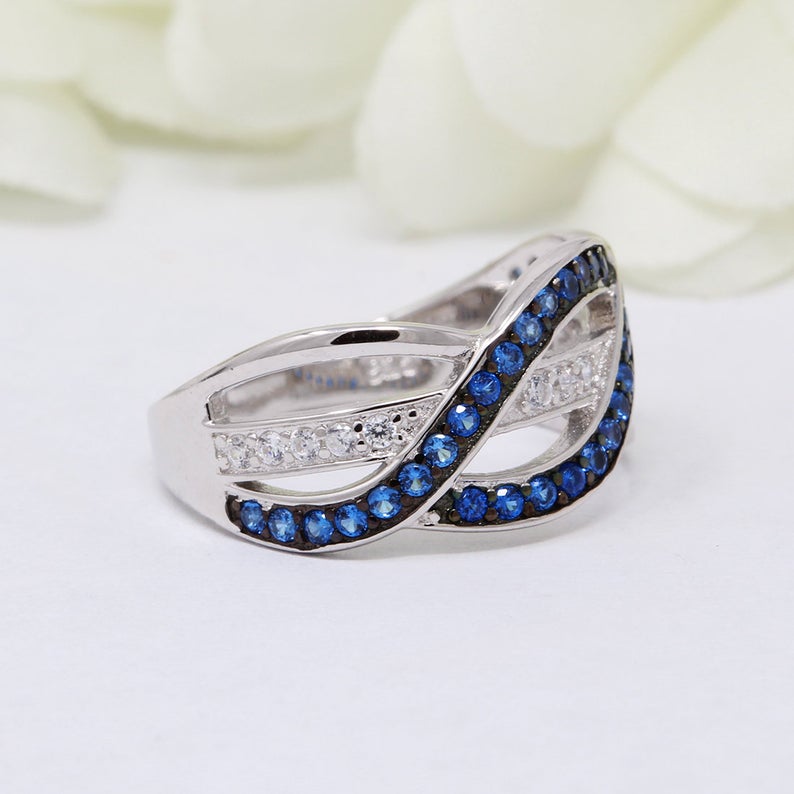 2.10 Ct Round Cut Blue Sapphire & White CZ Weave Crisscross Infinity Promise Ring In 925 Sterling Silver