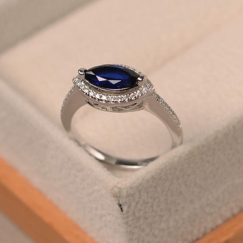 1.50 Ct Marquise Cut Blue Sapphire Halo Engagement Ring In 925 Sterling Silver - atjewels.in