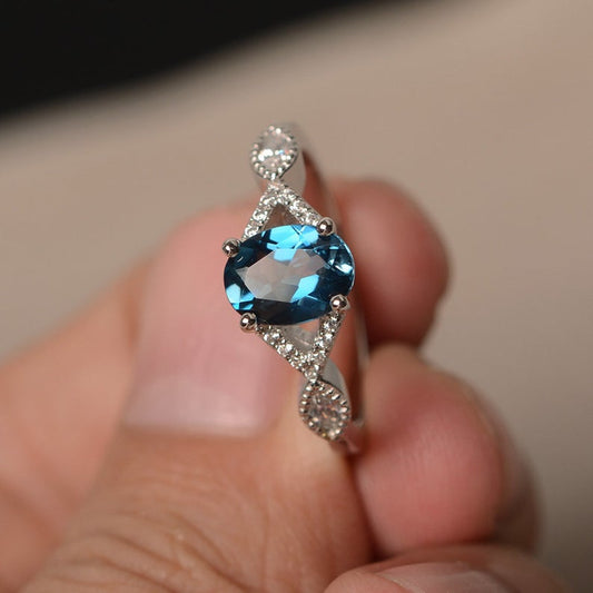 1.20 Ct Oval Cut London Blue Topaz 925 Sterling Silver Infinity Engagement Ring