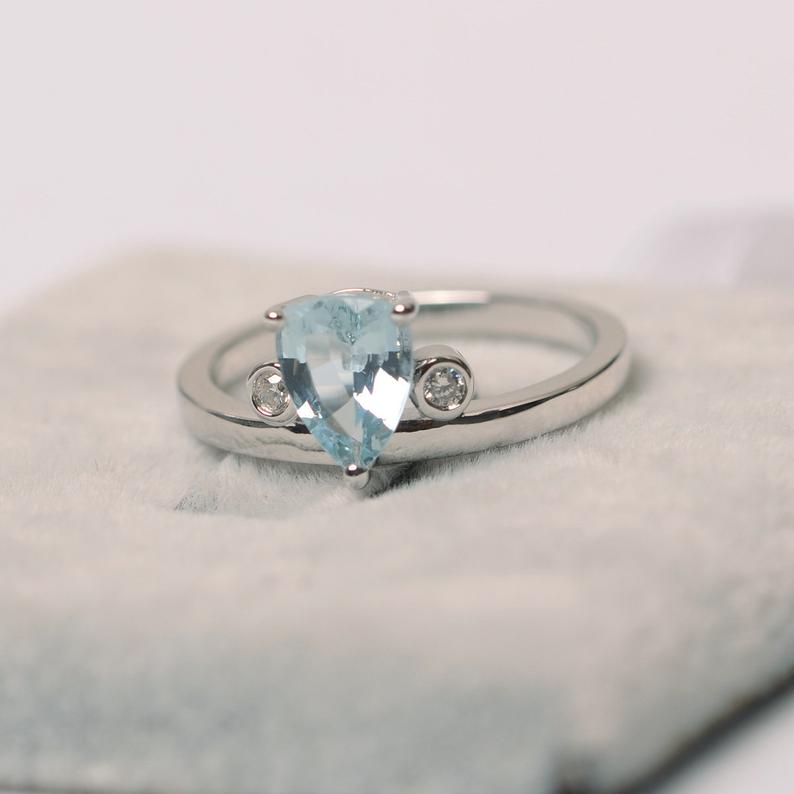 1.20 Ct Pear Cut Aquamarine & White CZ 925 Sterling Silver Three-Stone Promise Ring