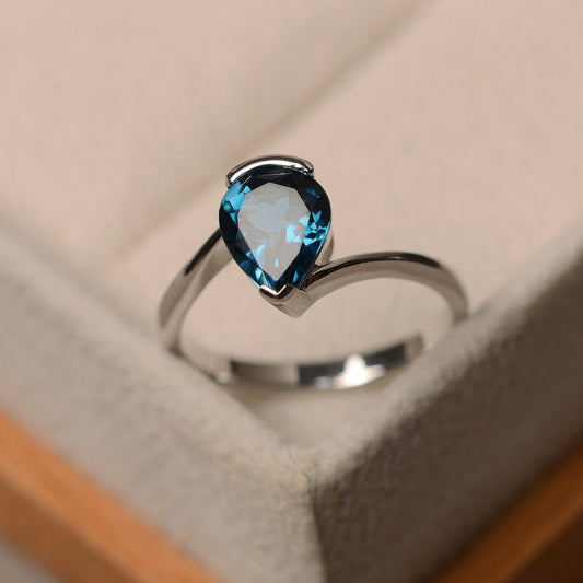 1 Ct Pear Cut London Blue Topaz Solitaire Bypass Proposal Ring In 925 Sterling Silver