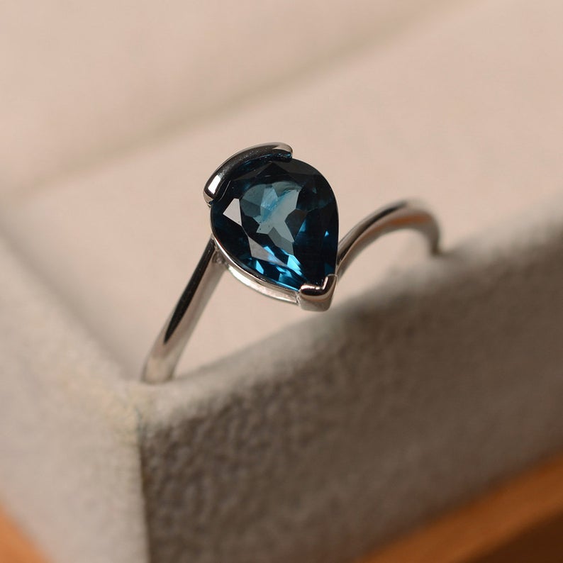 1 Ct Pear Cut London Blue Topaz Solitaire Bypass Proposal Ring In 925 Sterling Silver
