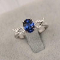 1.30 CT Oval Cut Blue Sapphire 925 Sterling Silver Angle Wings September Birthstone Ring