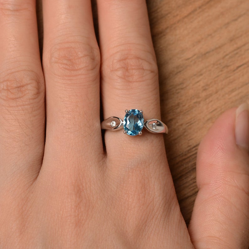 1.20 Ct Oval Cut Blue Topaz & Round CZ 925 Sterling Silver Three-Stone Promise Ring