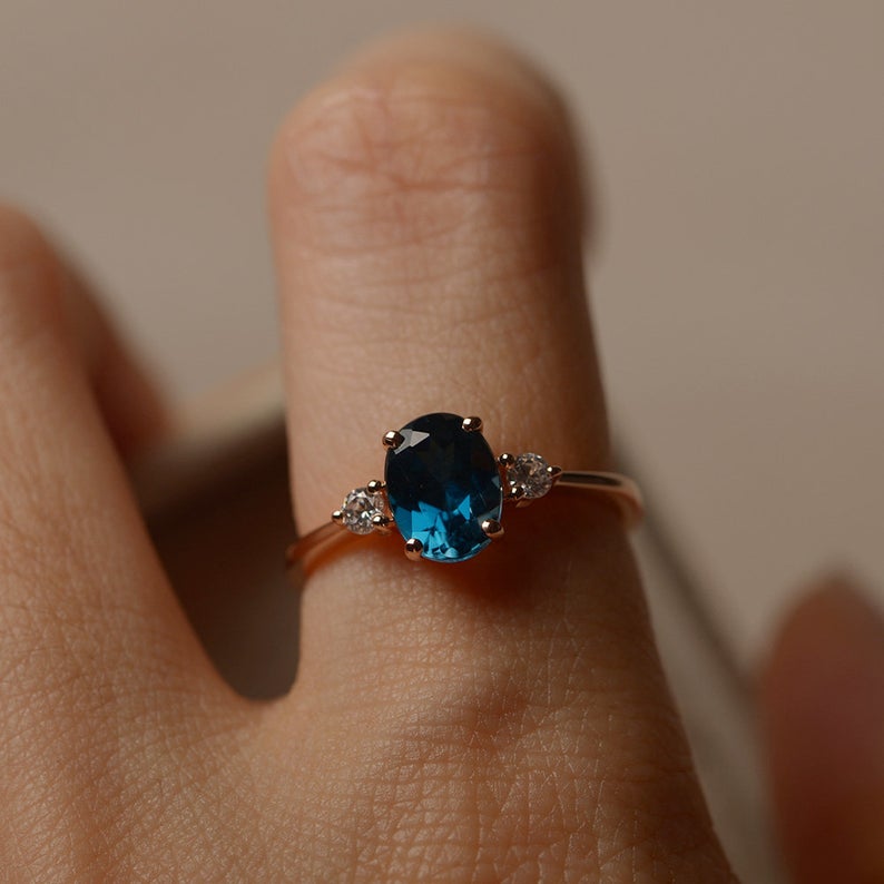 1.20 Ct Oval Cut London Blue Topaz Rose Gold Over On 925 Sterling Silver Three-Stone Promise Ring