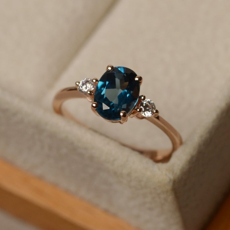 1.20 Ct Oval Cut London Blue Topaz Rose Gold Over On 925 Sterling Silver Three-Stone Promise Ring