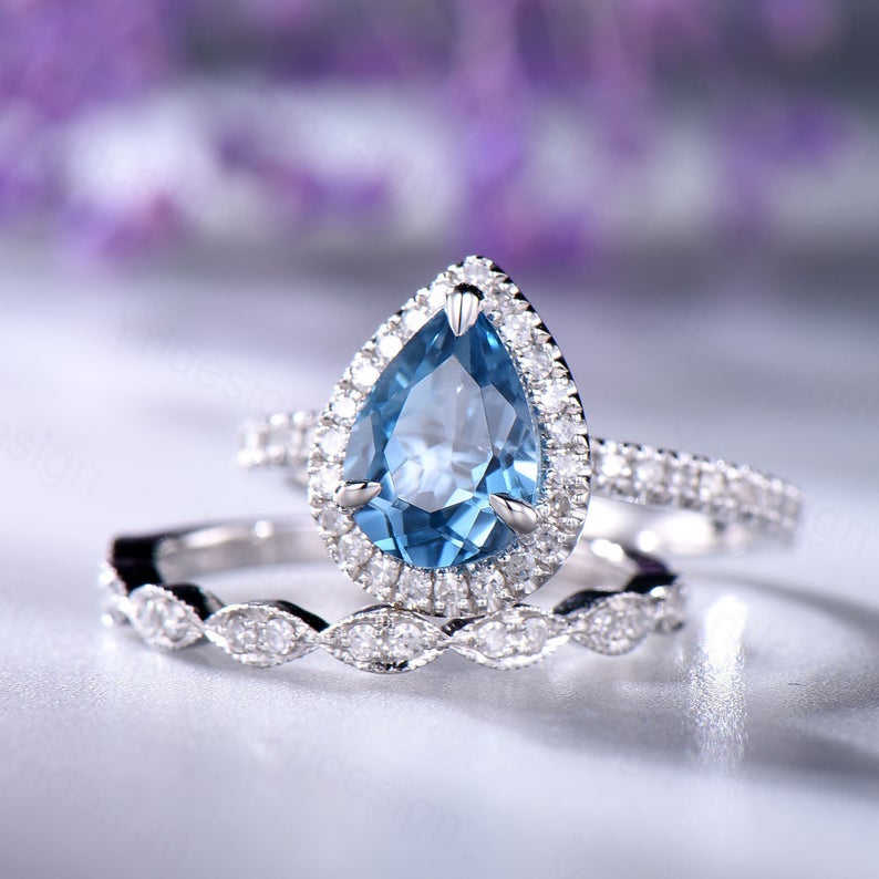 1 CT Pear Cut London Blue Topaz Diamond 925 Sterling Silver Halo Bridal Ring Set