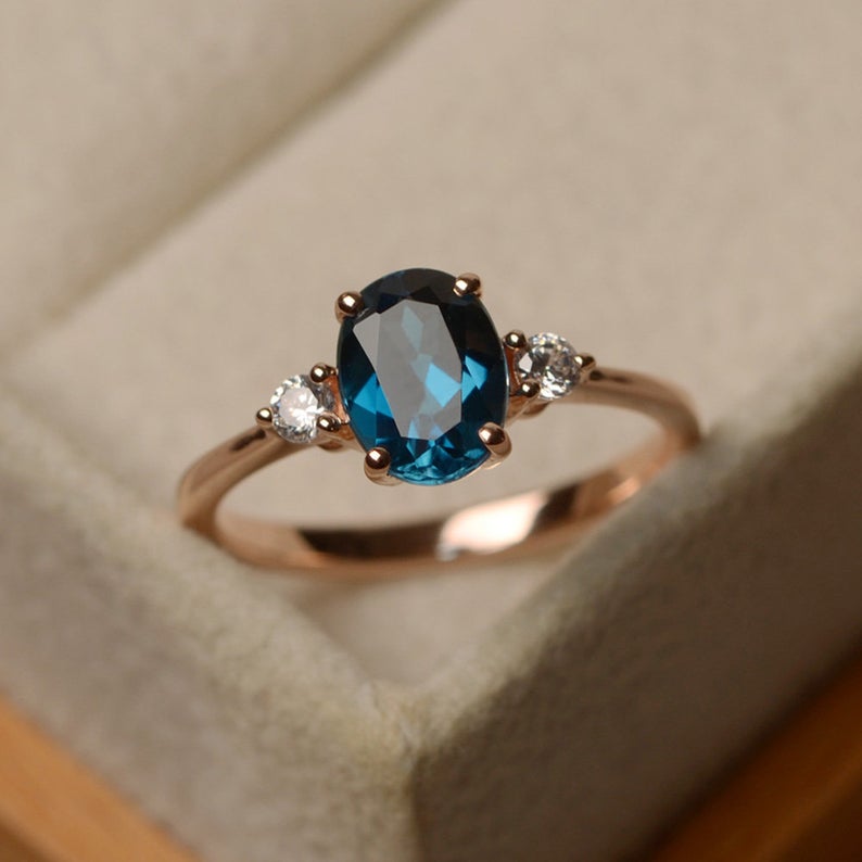 1.20 Ct Oval Cut London Blue Topaz Rose Gold Over On 925 Sterling Silver Three-Stone Promise Ring