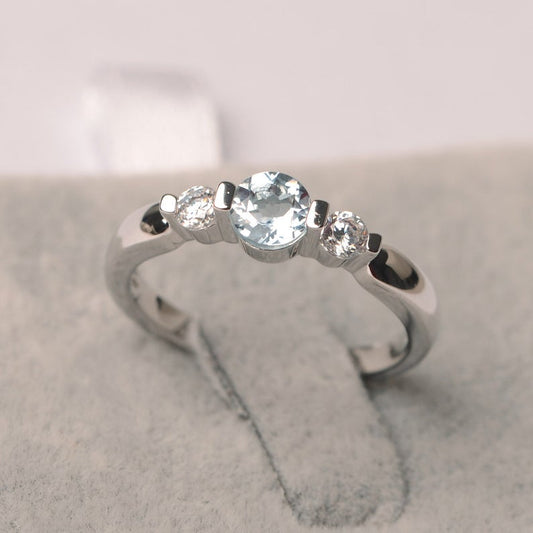 1.20 CT Round Cut Aquamarine & Round CZ Three-Stone Promise Ring In 925 Sterling Silver
